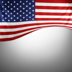 American flag on grey background. Copy space