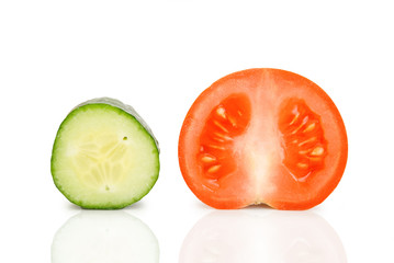 Tomatoes and cucumber isolated on white