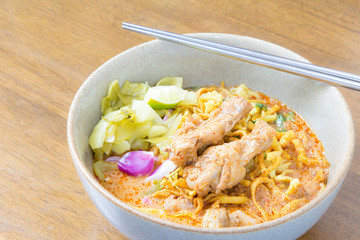 Noodle Khao soi , Thai food on wood background