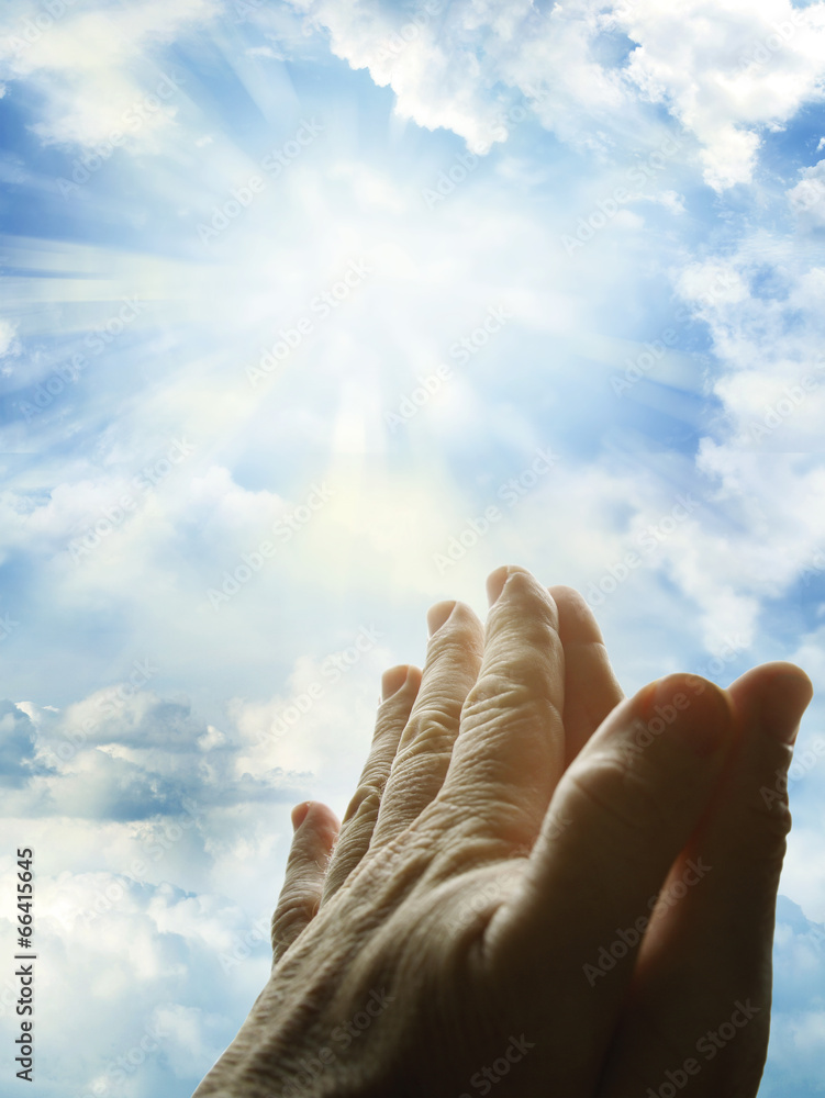 Poster Prayer hands in bright heaven sky