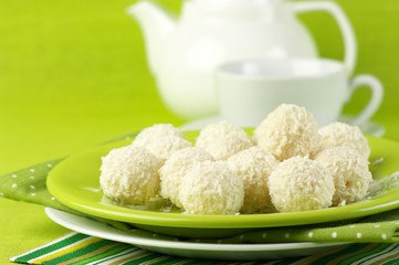 Coconut candies and tea