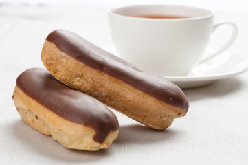 vanilla eclairs with chocolate frosting