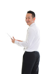 Asian business man using tablet computer isolated on white backg