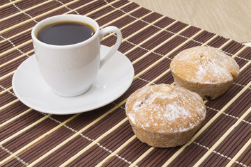 Cup of coffee and two cake