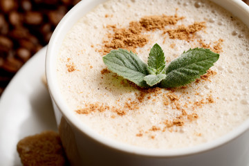 white coffee cup with mint and brown sugar