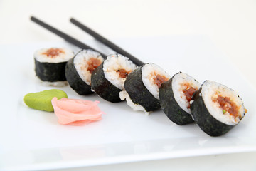 sushi on white plate. Traditional japanese sushi rolls