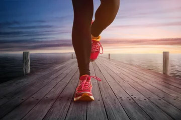 Selbstklebende Fototapete Joggen Joggen auf einem Steg