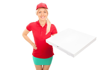 Delivery girl holding a box of pizza