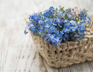Bouquet of spring flowers in basket
