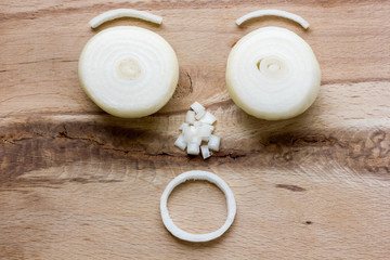Obraz na płótnie Canvas onion bulb on wooden cutting board close up