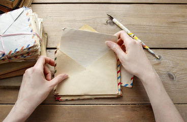 Woman reading letter from the past © agneskantaruk