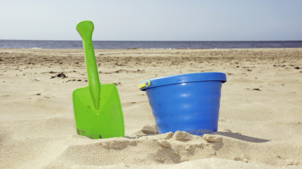bucket and shovel on the beach