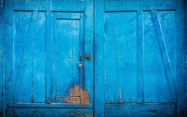 Fototapeta na wymiar Blue old wooden doors