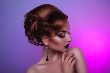 Creative hairstyle and professional make up on fashion woman