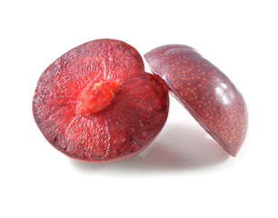plums isolated on white