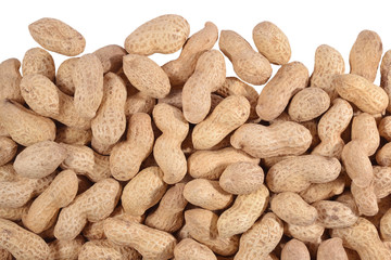 Heap of whole peanuts on a white