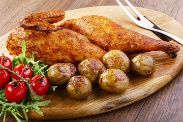 half baked chicken with new potatoes