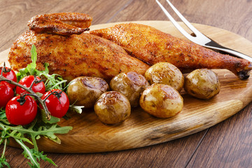 half baked chicken with new potatoes
