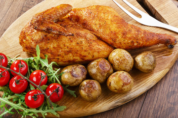 half baked chicken with new potatoes