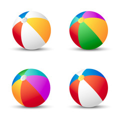 Colorful beach balls isolated on white with shadow. - 66444633