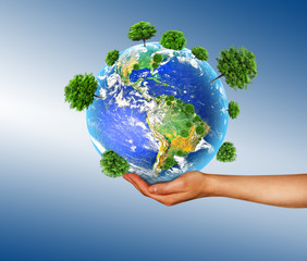 Globe on her hands, South and North America. Elements NASA