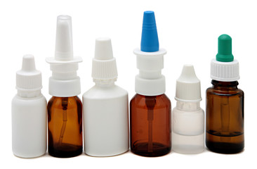 Bottles with and spray nasal drops isolated on white background