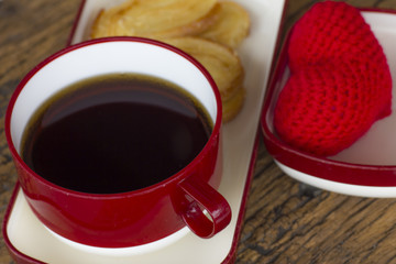Morning coffee with bread on the wooden table