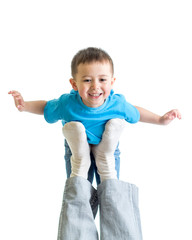 dad playing and holding kid on his foot