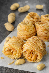 Closeup of birds nest baklava dessert with peanuts