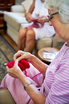 Knitting For Her Grandchildren