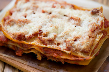 Close-up of lasagna bolognese, horizontal shot