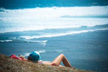 Girl Sitting on the Beach
