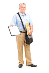 Mailman holding clipboard and bunch of envelopes