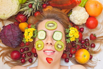 Female face with lot of fruit and vegetables