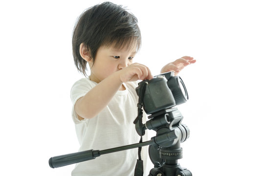 Little boy with camera