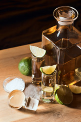 gold tequila with salt and lime