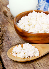 Dairy products on wooden background.