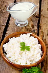 Dairy products on wooden background.