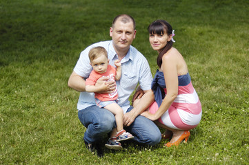 Fototapeta premium Family on grass