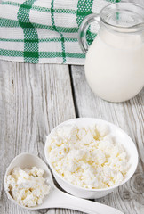 Dairy products on wooden background.