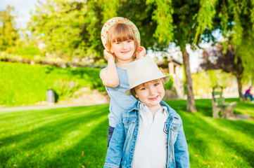 Fototapeta premium Summer portrait of adorable children on a nice sunny day