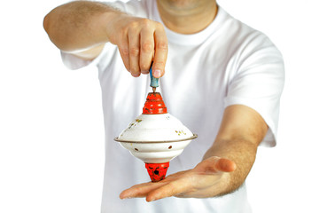 Top toy in hands