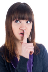 Naklejka premium Woman gesturing to silence