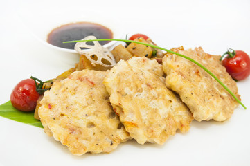 shrimp patties of meat with a salad