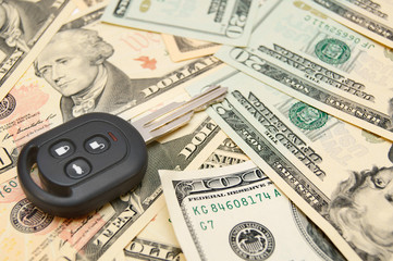 Fototapeta premium Key on banknotes.