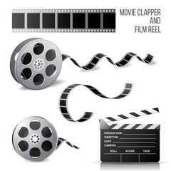 Fototapeta premium movie clapper and film reel