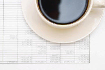 Coffee on documents.