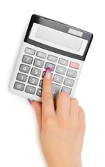 The calculator and hand.
