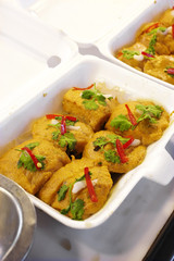 close up spicy fish steam in white box