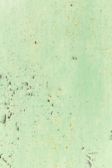 abstract background of rusty metal painted green